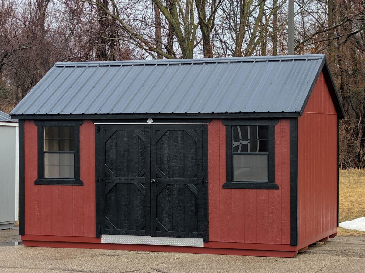 Red Garden Shed with black trim and diamond plate threshold
